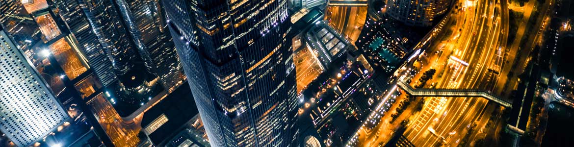 Canary Wharf London cityscape at night with HSBC building